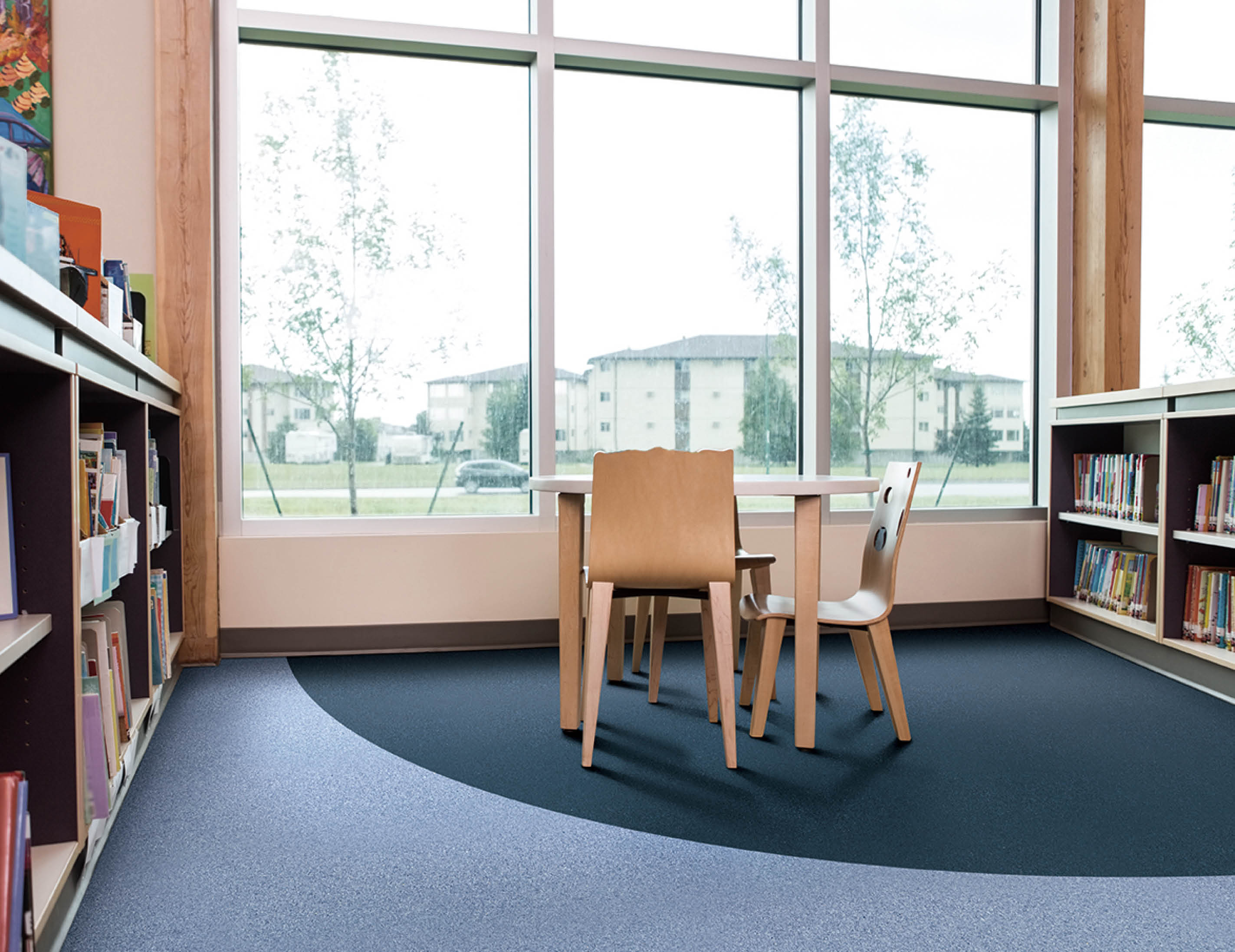 Interior of library with bookshelves and seating arrangement; Shutterstock ID 225428074