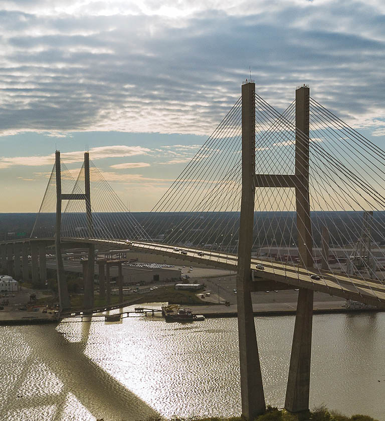 The aerial drone panoramic view of the Savannah and Talmadge Memorial Bridge over the Savannah River, on the border between Georgia and South Carolina, USA 